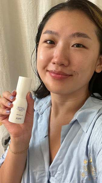 A selfie of Allure commerce editor Sarah Han after applying Iope Retinol Bounce Serum